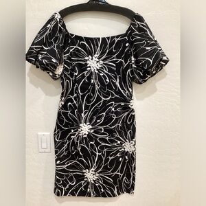 RICKIE FREEMAN. TERI JON BLACK AND WHITE FLORAL DRESS